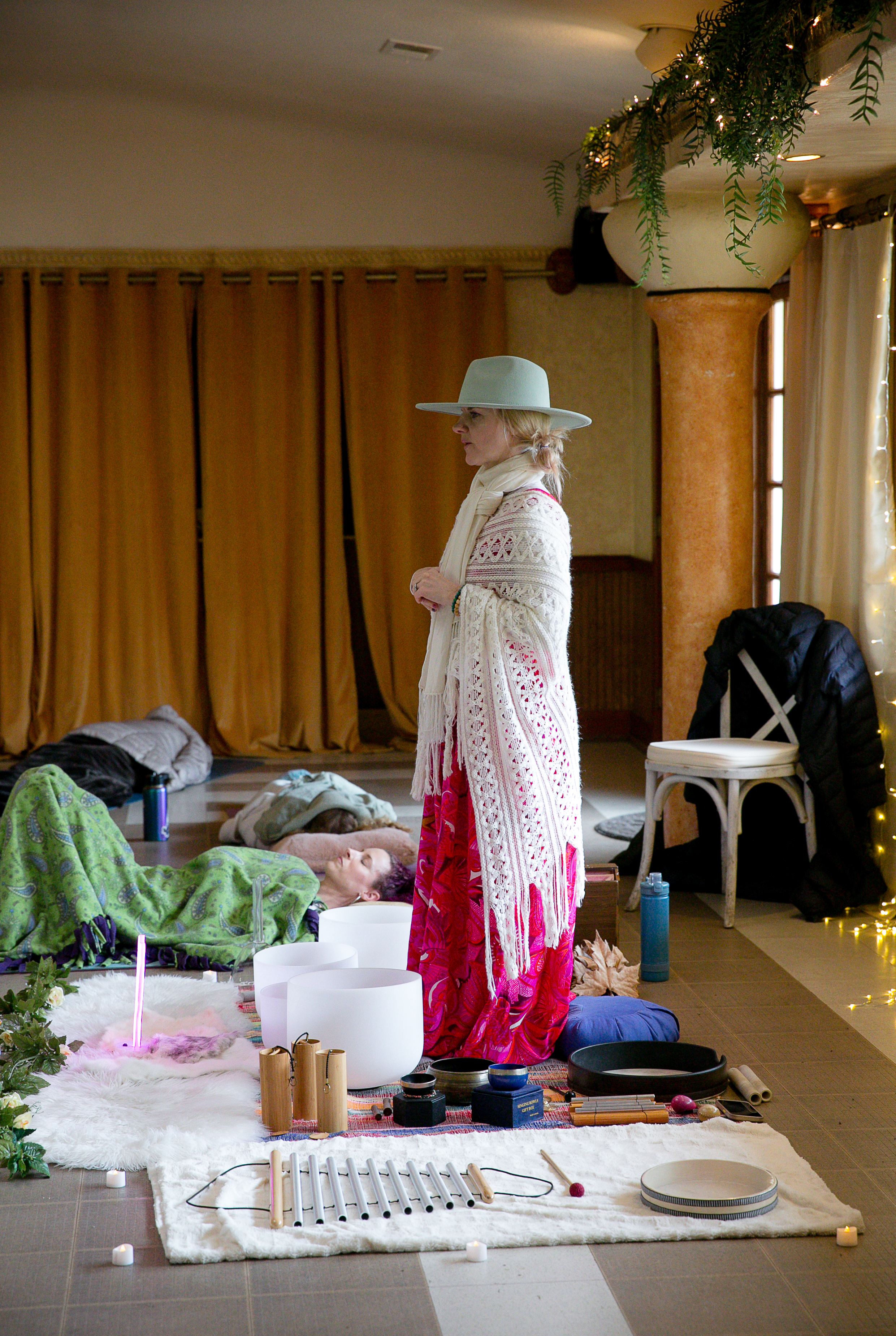 Chris guiding a sound healing gathering in a retreat setting
