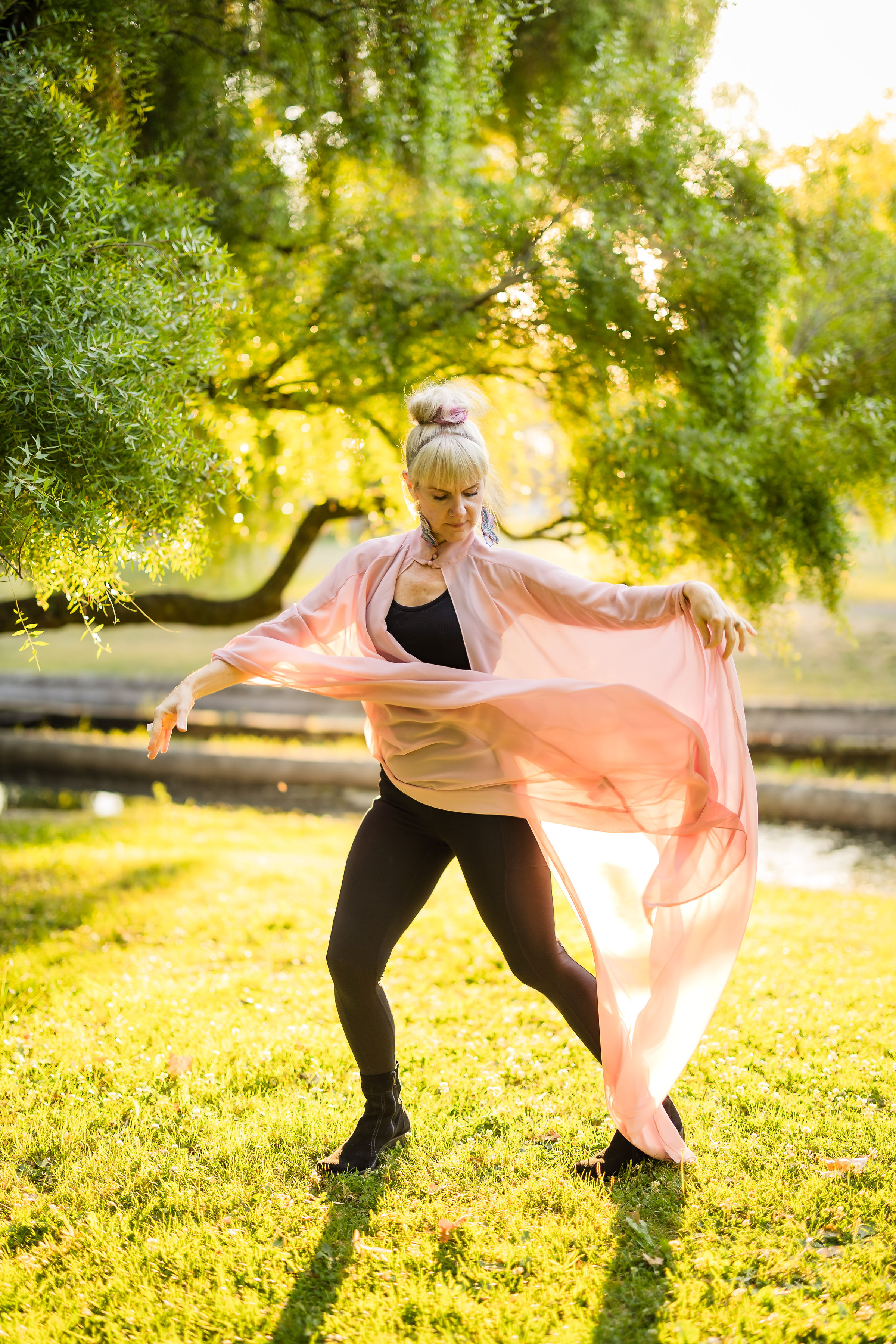 Expressive movement in a sunlit outdoor setting