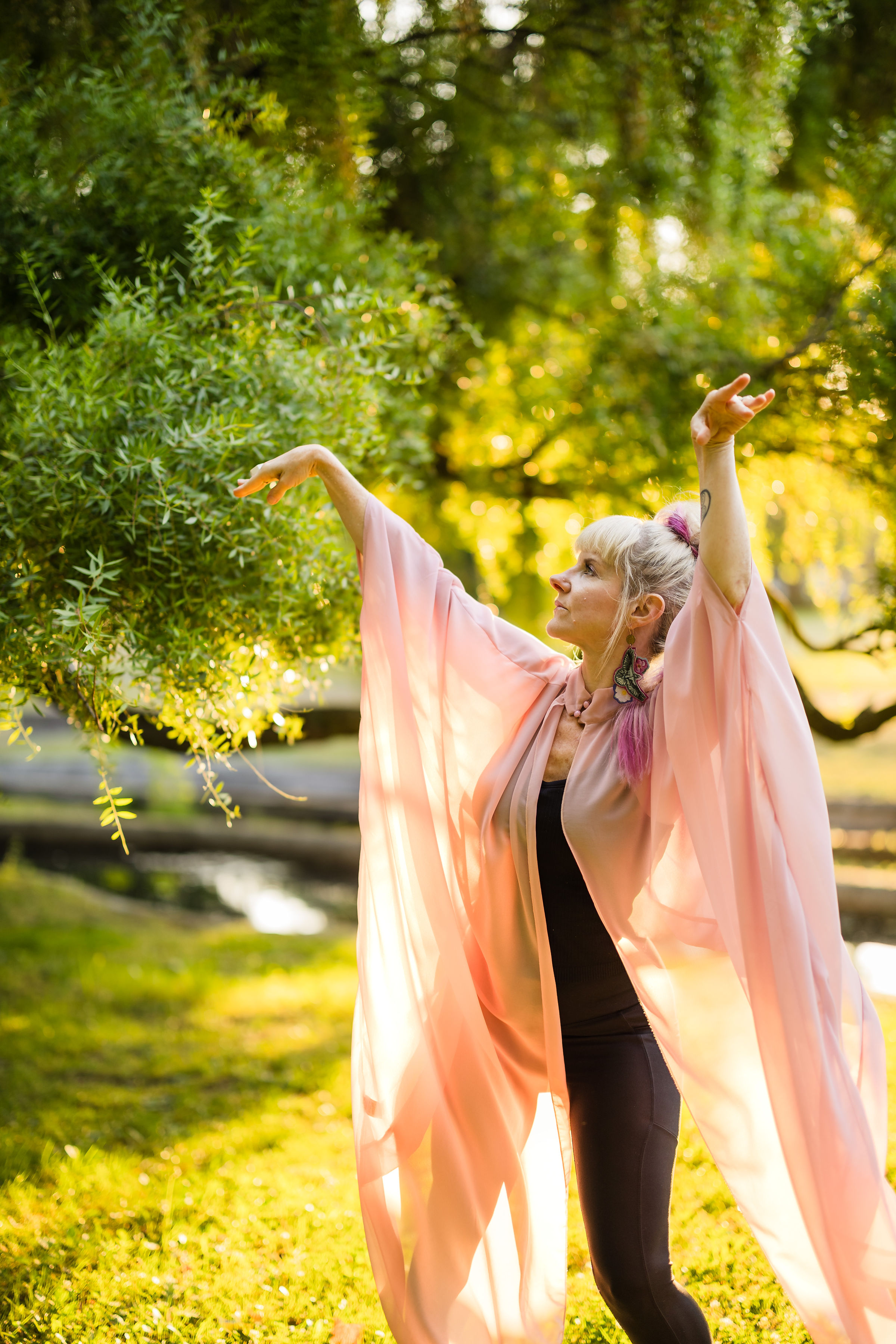 Chris Young-Ginzburg in expressive movement outdoors